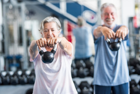 elder people fitness exercise weight lifting