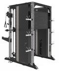 A heavy-duty black and silver Amstaff Artis Smith Machine featuring an integrated power rack, dual adjustable pulleys, pull-up handles, and various attachments including J-hooks and spotter arms.